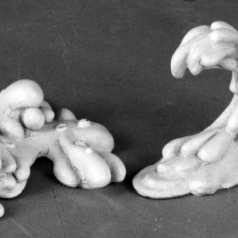 Reaper Miniatures Reaper: Slimes set featuring two green, translucent slime figures for tabletop gaming and miniatures collection.