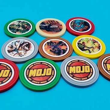 Xcrawl Mojo Tokens RPG book by Goodman Games, featuring a detailed cover with game-related artwork and colorful design elements.