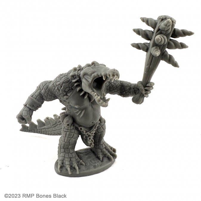 Reaper Miniatures Reaper: Gatorman figure wielding a large club, detailed sculpt with menacing stance and tribal armor.
