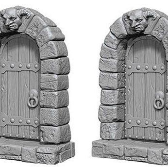 Unpainted plastic miniature door from Wizkids D&D Deep Cuts Unpainted Miniatures W05 Doors set for tabletop gaming.