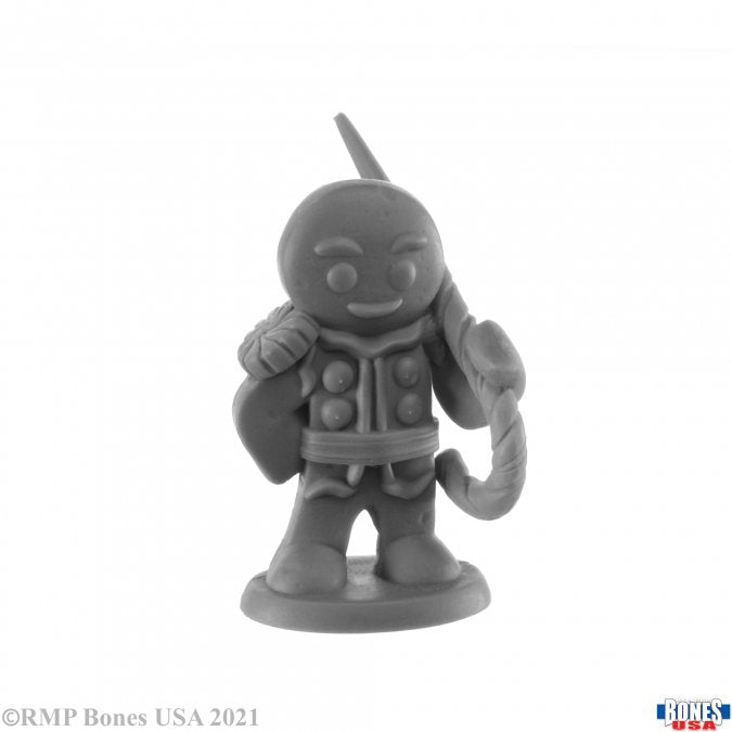 Reaper Miniatures Gingerbread Knight figure, detailed plastic miniature with armor and festive gingerbread design, ready for tabletop gaming.