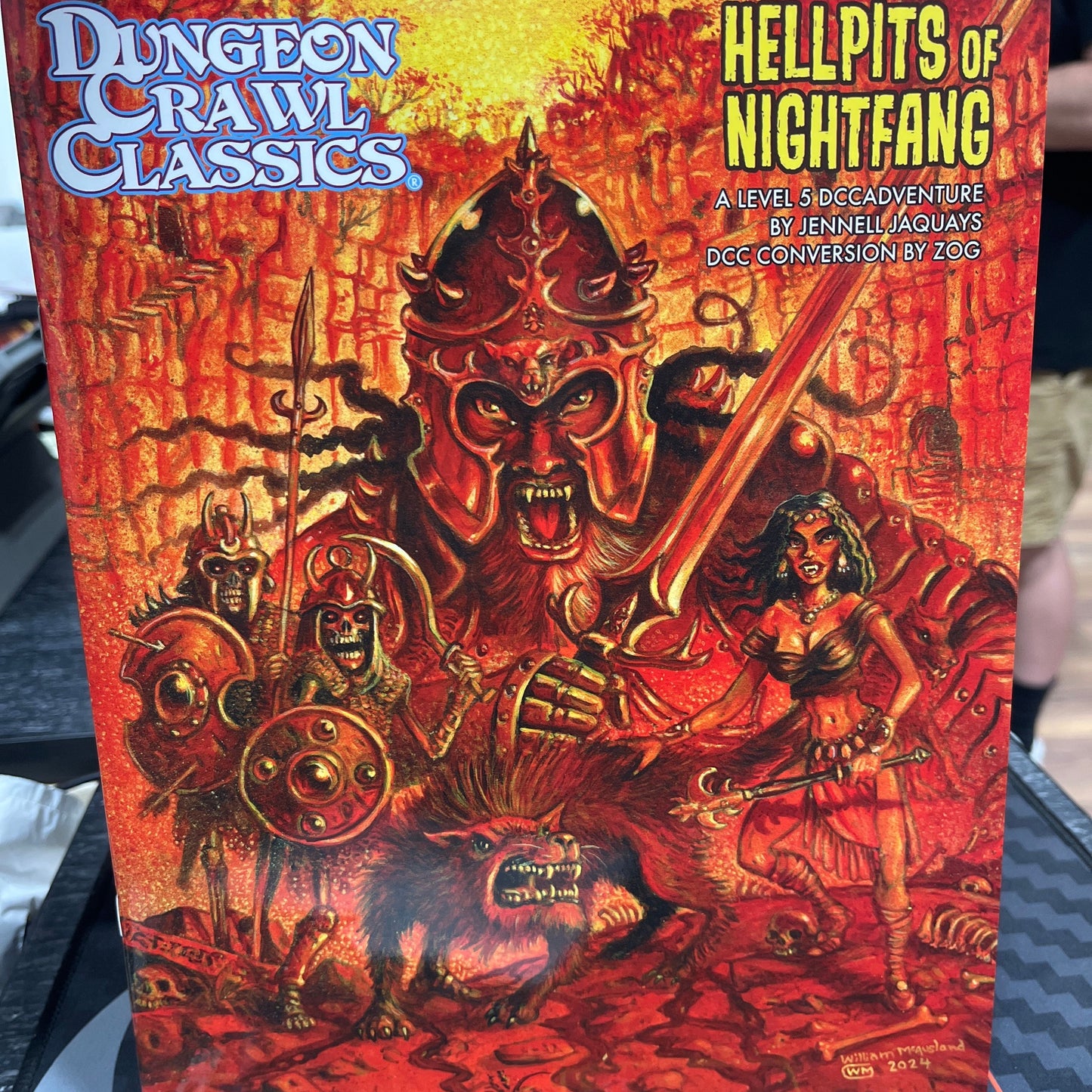 DCC Hellpits of Nightfang RPG book by Goodman Games showing dark fantasy cover art and title.
