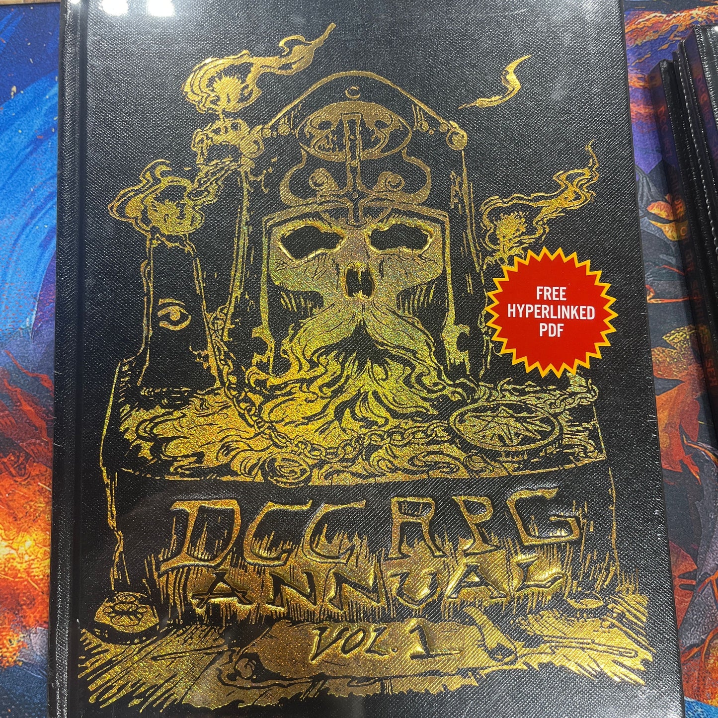 Cover image of the DCC RPG Annual Vol. 1 Gold Foil Edition book by Goodman Games featuring gold foil accents and detailed artwork.
