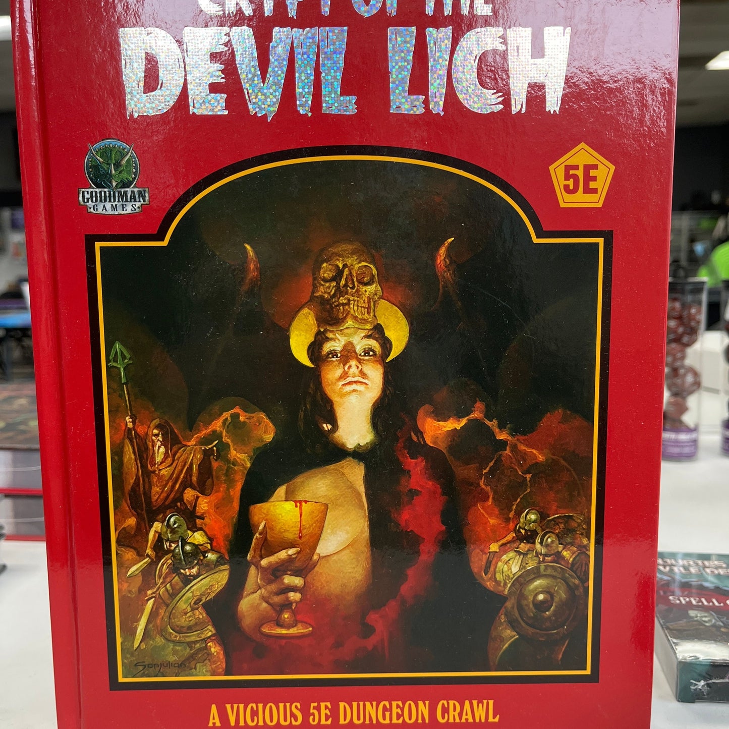 Crypt of the Devil Lich D&D 5e RPG book by Goodman Games showing detailed cover art and dark fantasy design.