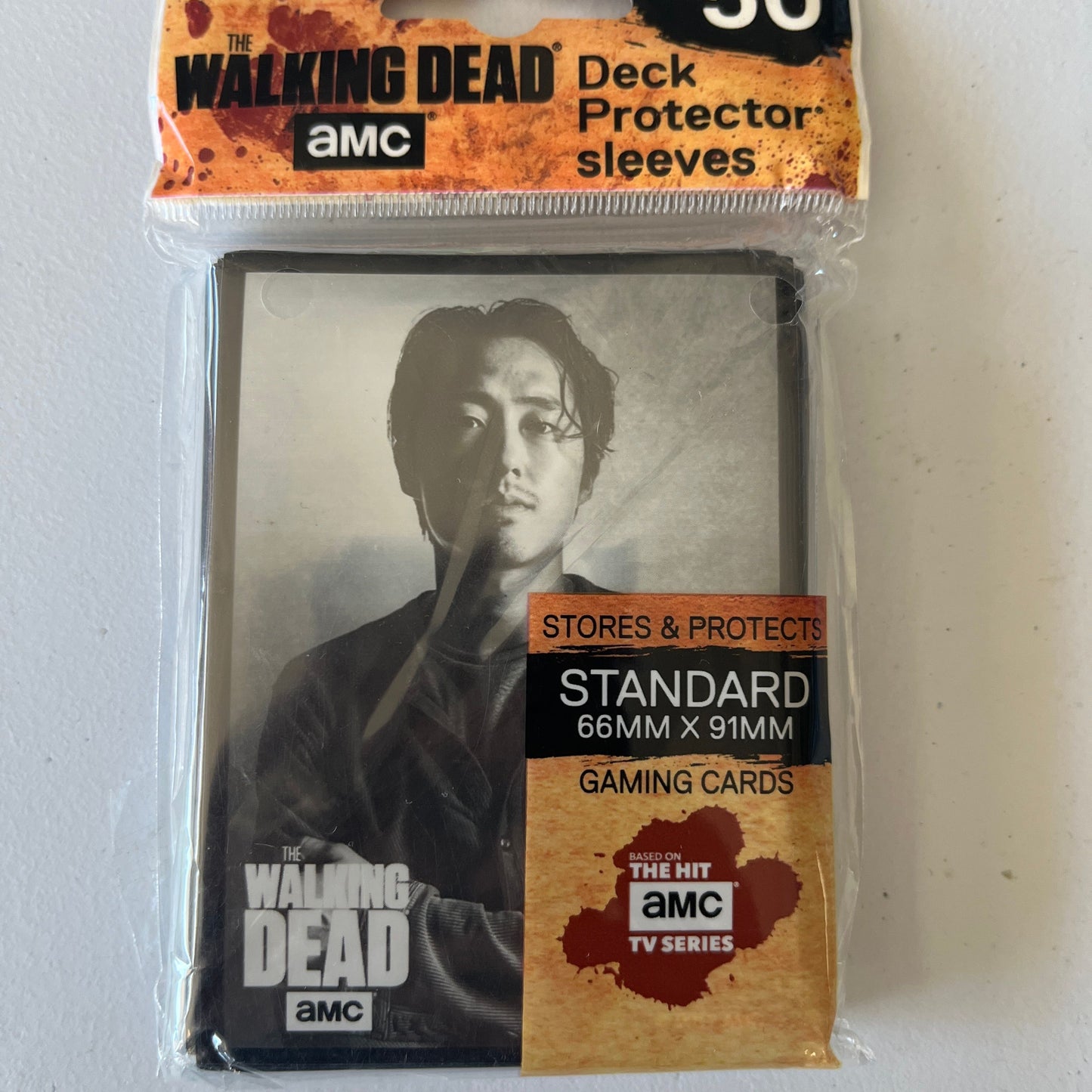 Ultra Pro Walking Dead card sleeves featuring Glenn, set of 50 protective plastic card holders for collectible trading cards.
