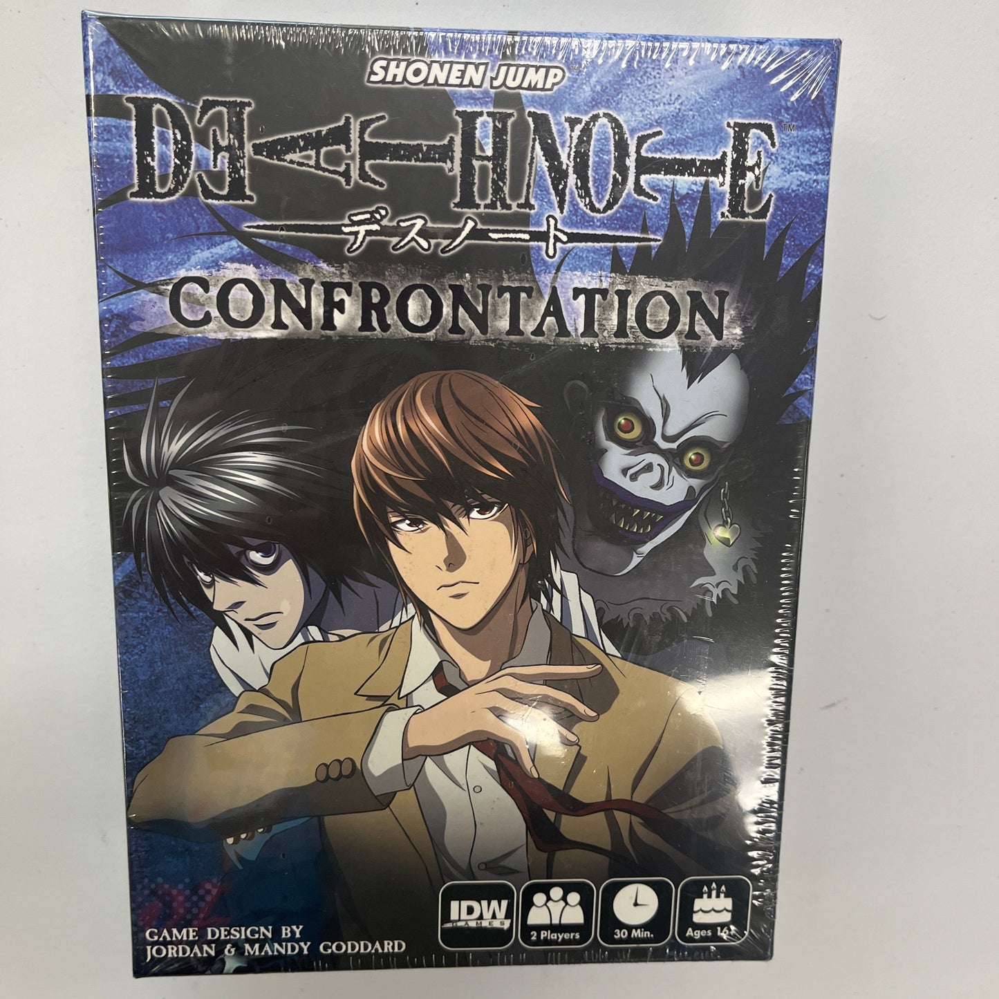 Death Note: Confrontation Strategy Board Game by IDW featuring game components and illustrated artwork on the game box.