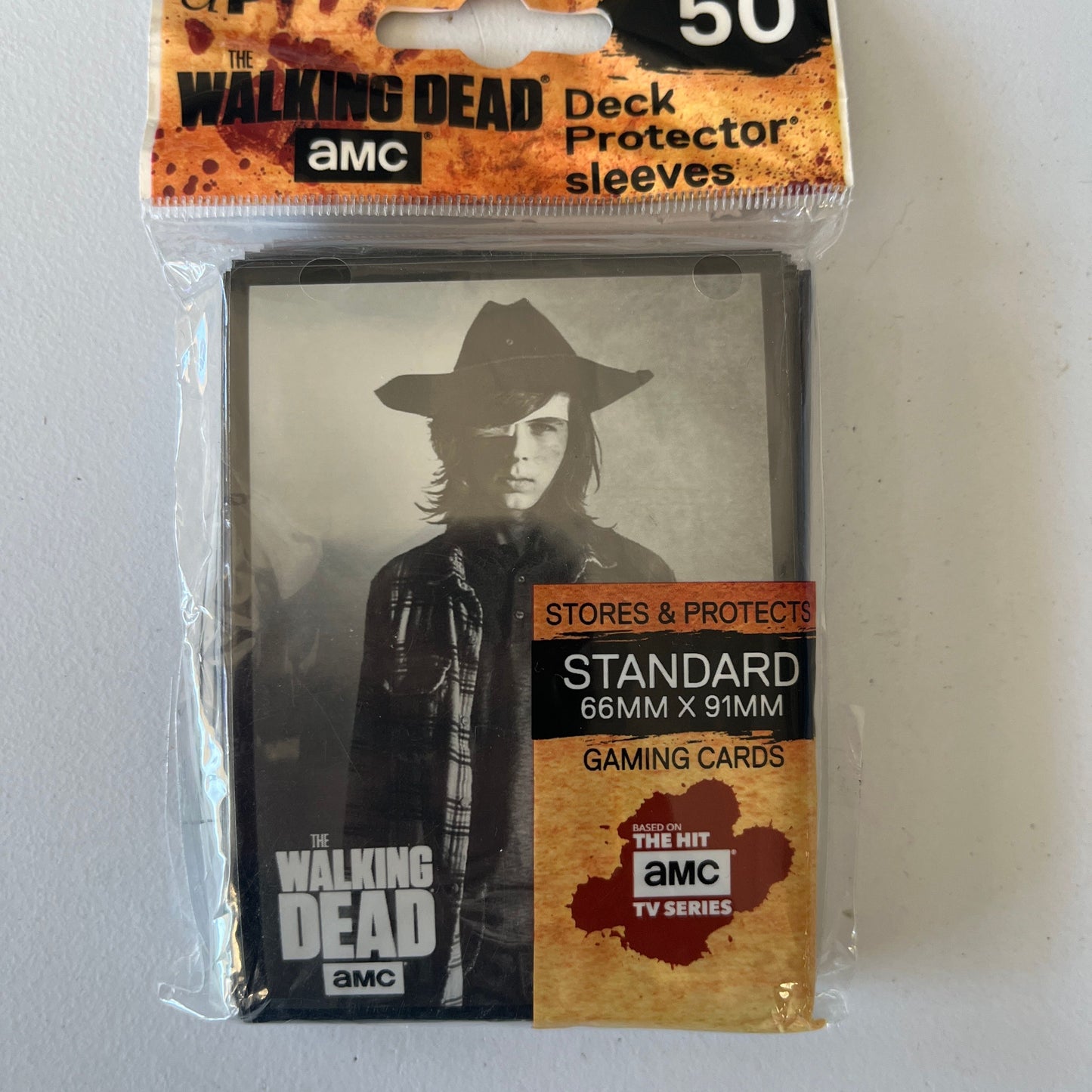 Ultra Pro Walking Dead card sleeves featuring Carl, set of 50, designed to protect collectible trading cards.