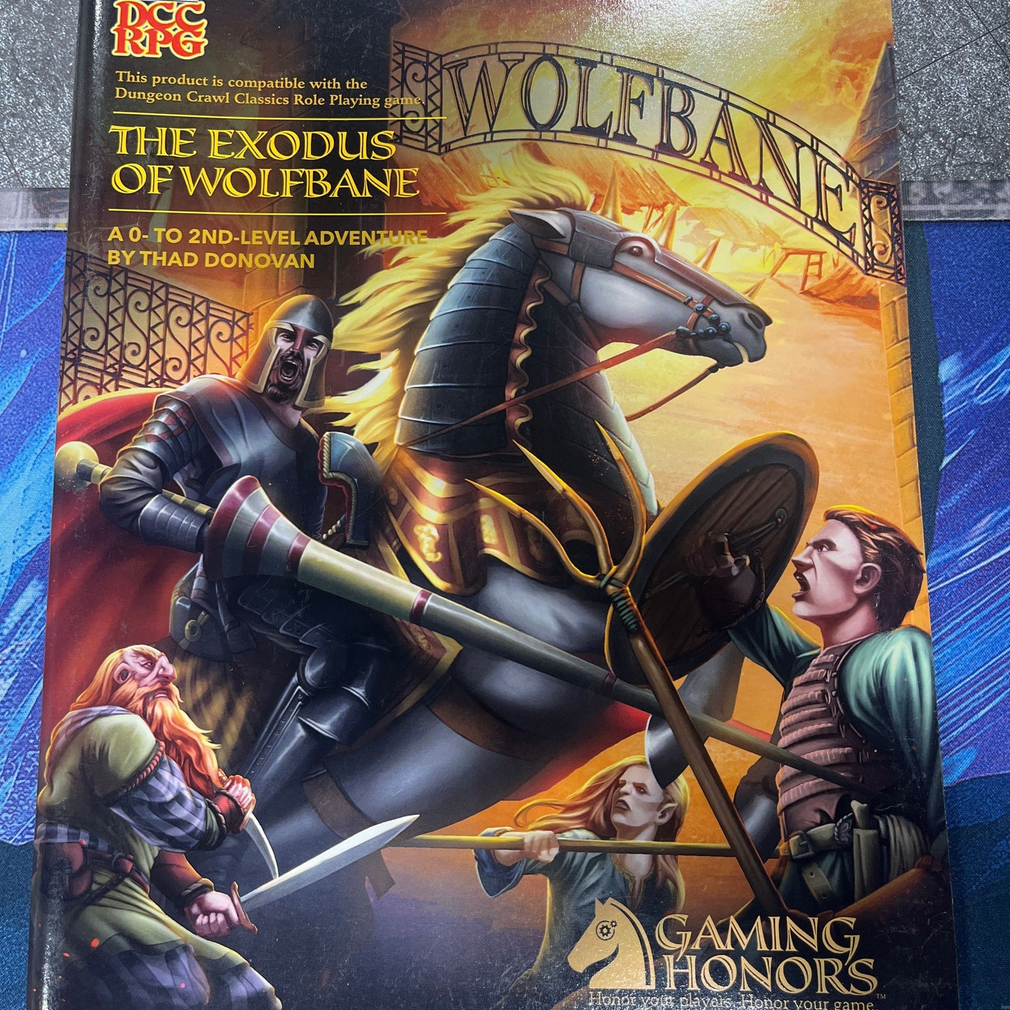 Cover image of "The Exodus of Wolfbane" RPG book by Goodman Games, featuring fantasy artwork and detailed title text.