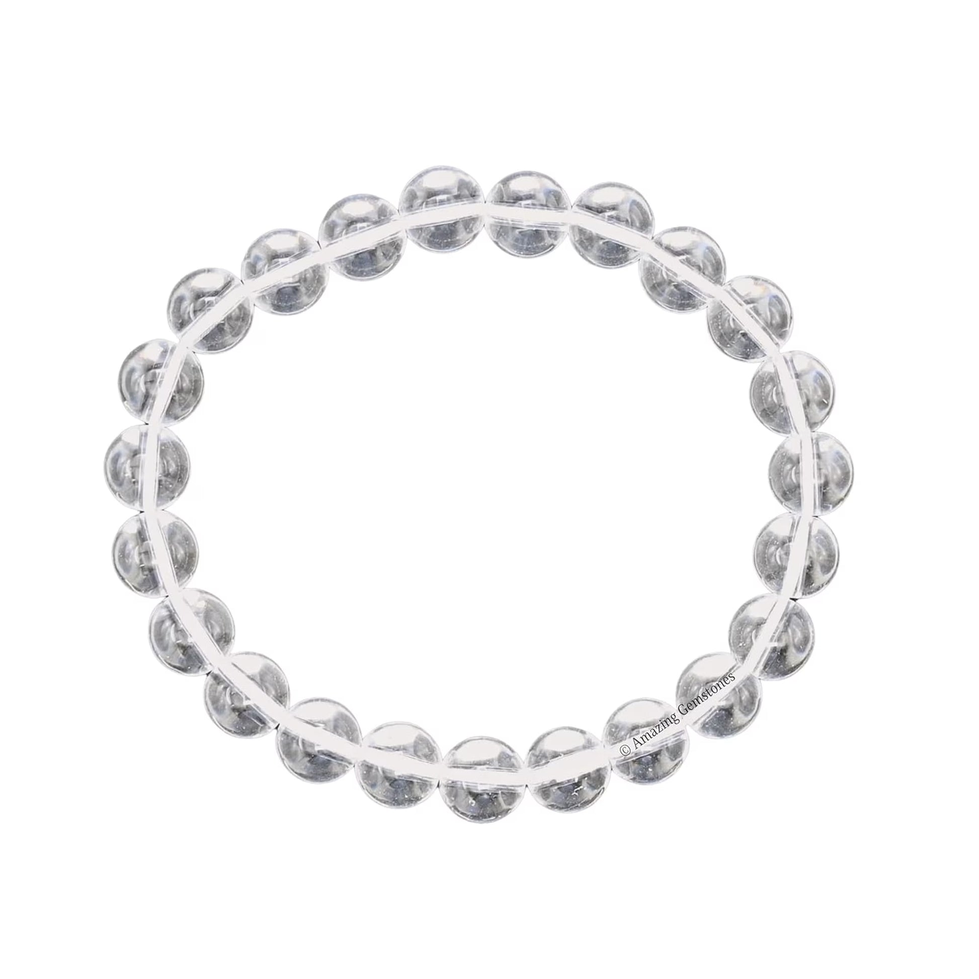 Natural stone bracelet from Creepy Crystals featuring round, polished stones in earthy tones on an elastic band.
