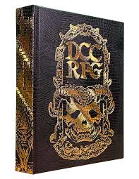 Dungeon Crawl Classics Core Rulebook by Goodman Games, hardcover fantasy RPG book with gold foil demon head cover design.