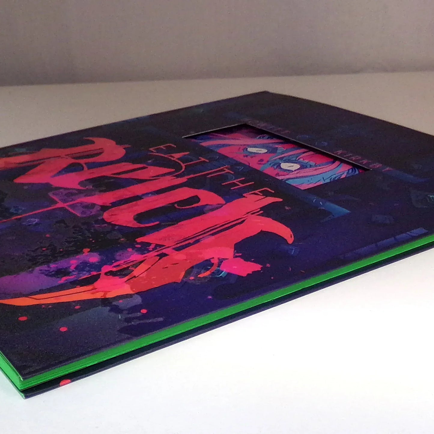 Neon green Eat the Reich RPG corebook by Studio 2 Publishing, featuring cover art and branding for the tabletop role-playing game.